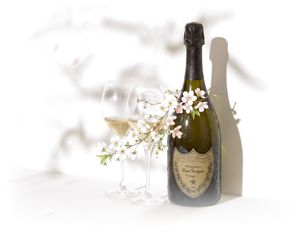Champagne bottle and glasses with white blossom